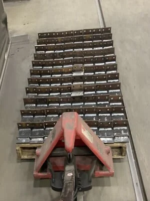 Welded steel stair stringers with treads and risers, fabricated steel staircase components